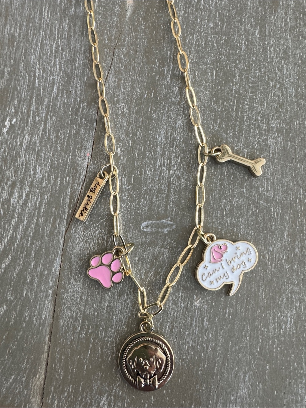 Gold-tone Dog Charm Necklace with Pink Paw